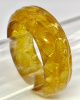 BB167 geometric reverse carved applejuice prystal/bakelite bangle with ripple carving on the outside
